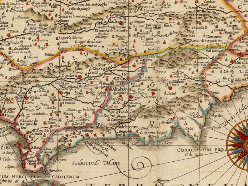 May include: An antique map of the Iberian Peninsula, showing the regions of Spain and Portugal. The map is printed on paper and features a compass rose in the lower right corner. The map is in a vintage style with handwritten text and illustrations.