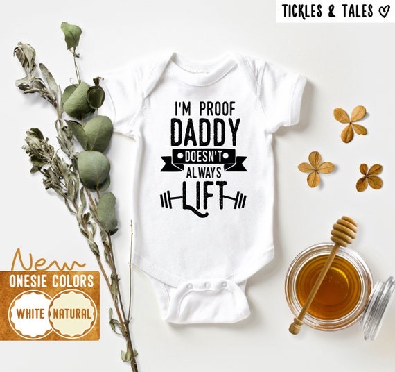 Gym Dad Baby Onesie®: Funny "I'm Proof Daddy Doesn't Always Lift" Cotton Bodysuit