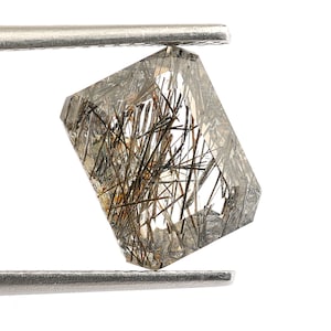 Naturlig svart rutilkvarts oktagon ädelsten, smaragdslipad 10 x 8 mm för smyckestillverkning