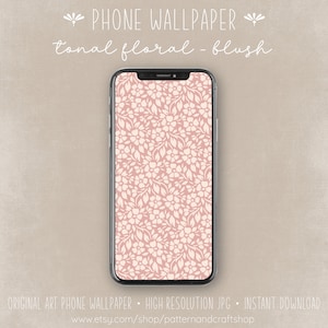 May include: A blush pink phone wallpaper with a white floral pattern. The text "PHONE WALLPAPER tonal floral - blush" is at the top of the image.