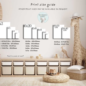 May include: Print size guide for artwork, showing different sizes in inches and millimeters. The guide includes standard sizes like A2, A3, A4, and A5, as well as popular print sizes like 16x20, 12x16, 11x14, and 8x10. The guide also includes sizes in centimeters, such as 40x50 cm and 30x40 cm.