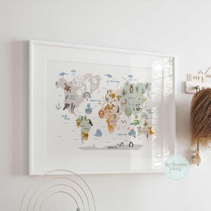 Pastel-toned world map art print for nursery walls featuring animals and ocean labels.