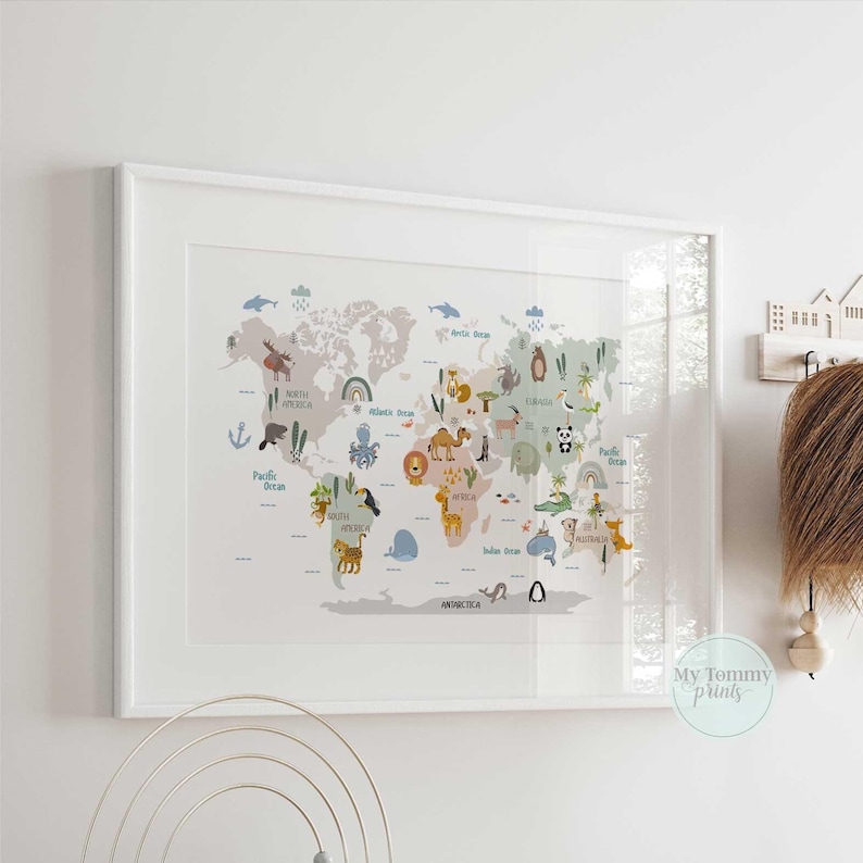Pastel-toned world map art print for nursery walls featuring animals and ocean labels.