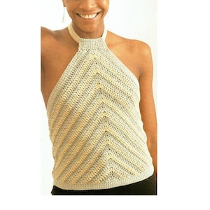 May include: A crocheted halter top with a chevron pattern in beige and gray.