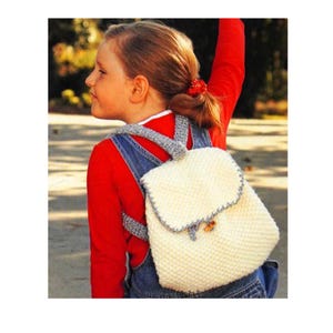 May include: A trio of ceramic mugs with a speckled, matte finish in cream, light grey, and dark grey. Each mug features a simple, minimalist design, ideal for tea or coffee.