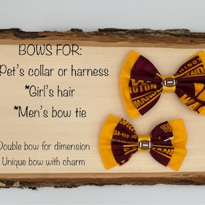 May include: Two fabric hair bows with a football charm. The bows are made of maroon and gold fabric with a Washington Huskies logo. The text "BOWS FOR:" is written on a wooden surface. The text below the title reads "* Pet's collar or harness * Girl's hair * Men's bow tie Double bow for dimension Unique bow with charm"