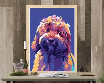 May include: A framed pop art style print of a dog with a blue background. The dog's fur is rendered in a mosaic of vibrant colors including purple, orange, yellow, and blue. The print is displayed on a wooden table.