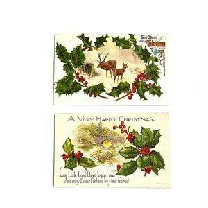 1909 CHRISTMAS POSTCARDS,  2- embossed full color with scenic images and holly, writing on back and 1 cent stamp, free domestic shipping