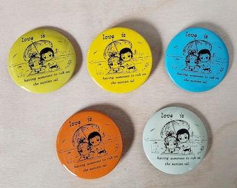 Love is... having someone to rub on the suntan oil, By Kim, metal buttons,  SOLD INDIVIDUALLY, vintage, pins, circa 1970's