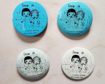Love is... a sunny feeling on a rainy day, By Kim, metal buttons,  SOLD INDIVIDUALLY, vintage, pins, circa 1970's