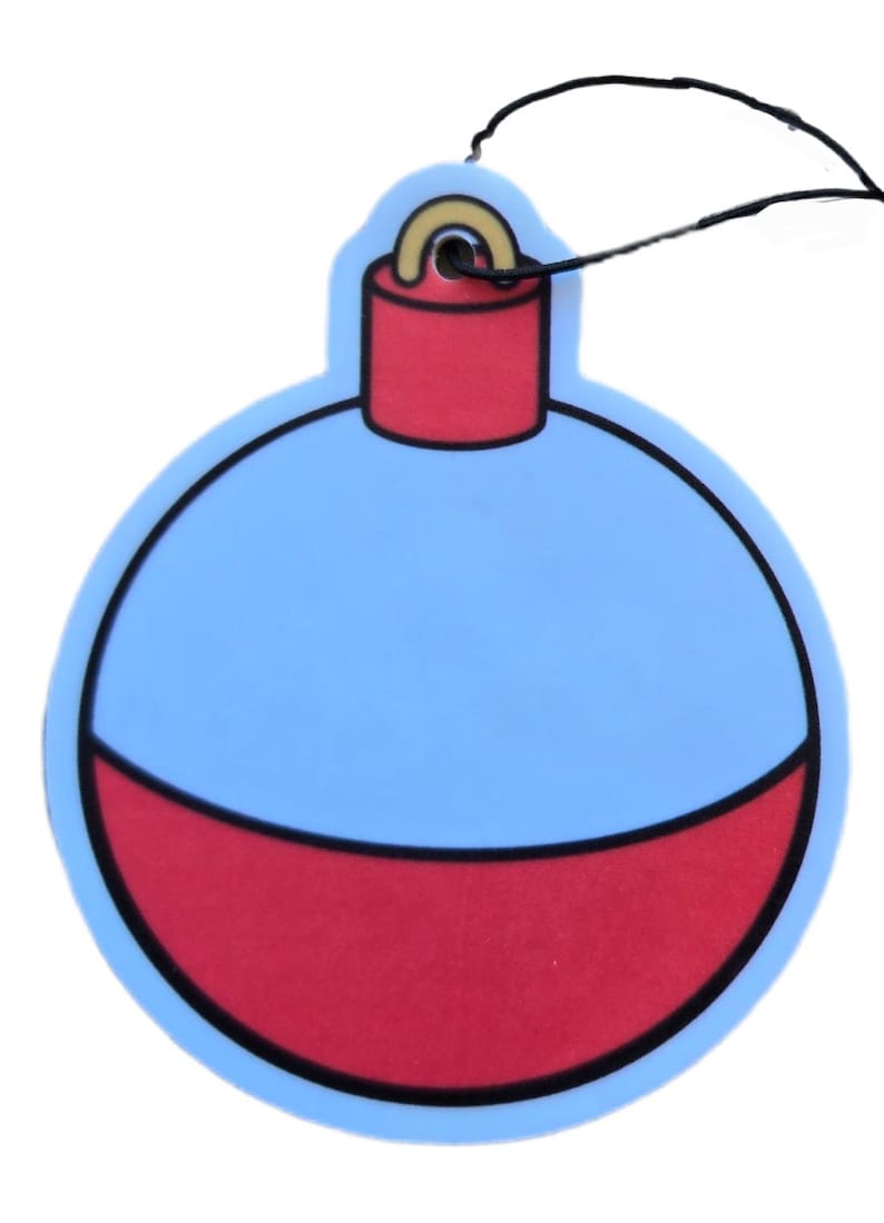 May include: A blue and red ornament-shaped air freshener with a black string for hanging. The ornament has a light blue upper section and a red lower section, separated by a black outline. The top section is red with a gold-colored loop.
