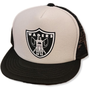 May include: A black and white trucker hat with a black and white logo that says "WADERS" and a graphic of a person wearing waders and holding fishing rods. The hat has a black mesh back.