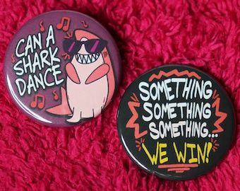 Can a Shark Dance and Something Something We Win Pin | Nimona Inspired Buttons