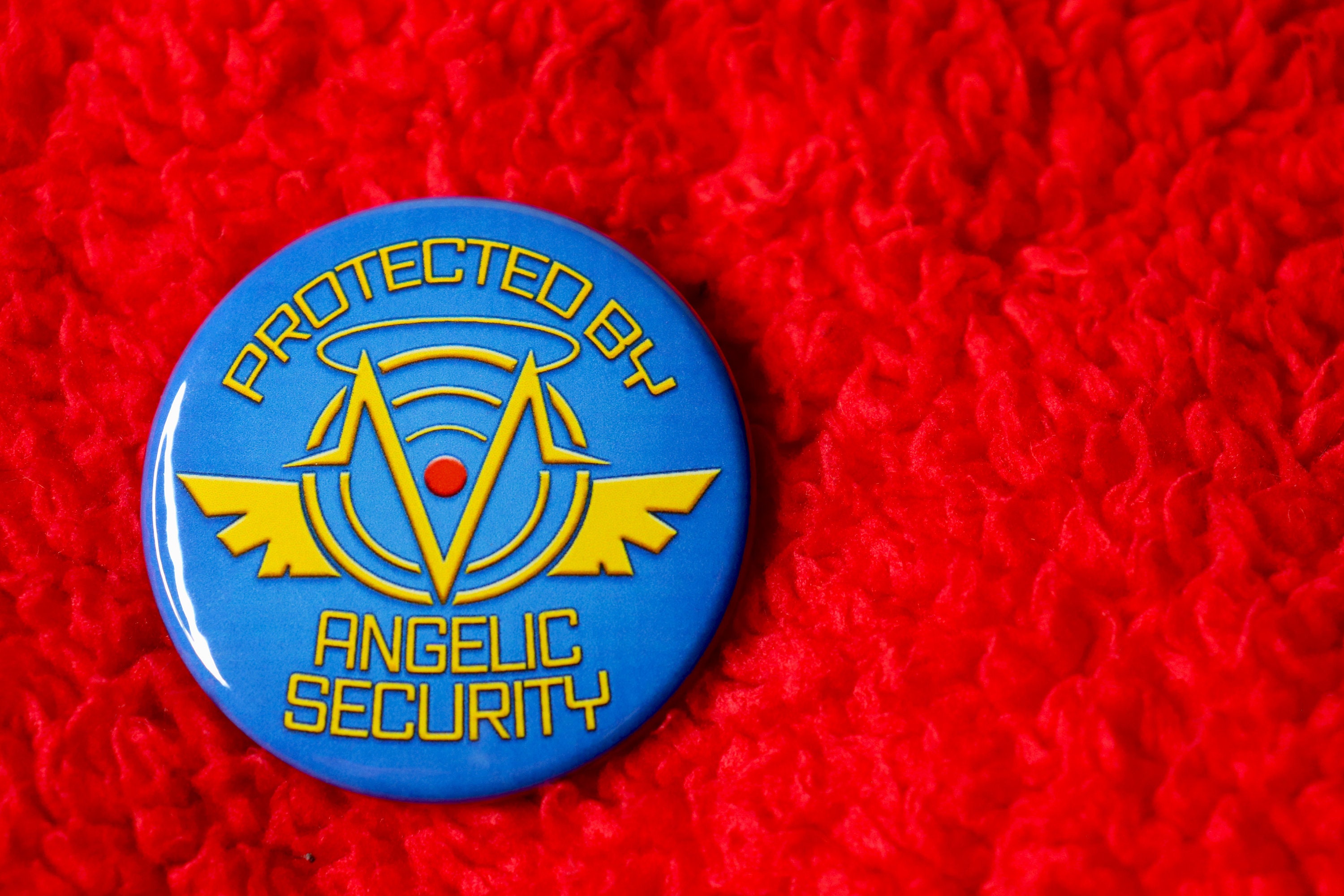 Protected by Angelic Security Pin | Vox Tech Inspired Button - Etsy