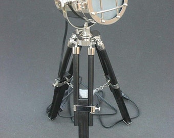 Silver spot light with black polished wooden tripod