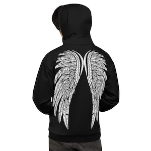 May include: Black hooded sweatshirt with a white graphic of angel wings on the back.