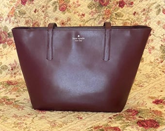 Kate Spade New York Hand Bag Purse Lawton Way Rose Tote “Deep Plum” Sold Out Style leather; inner satin lining, zipper pouch; Burgundy color