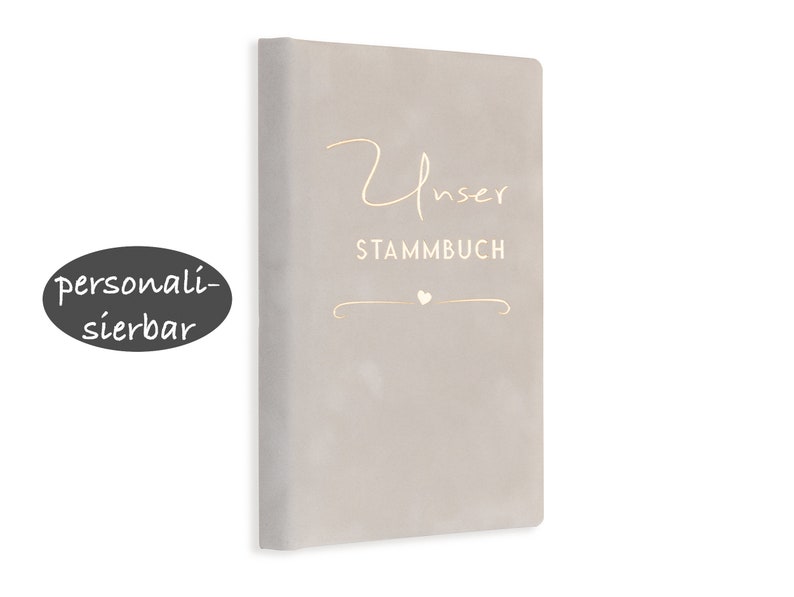 May include: A gray, textured book with the text "Unser Stammbuch" in gold lettering. The book is personalized with a small heart.