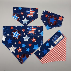 May include: Four different styles of fabric bandanas with a red, white, and blue patriotic theme. The bandanas feature stars, fireworks, and gingham patterns.