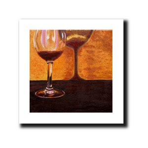 May include: Two wine glasses, one filled with red wine, on a dark brown surface against a warm orange background. The glass on the right is empty and appears to be a reflection of the glass on the left.