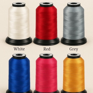May include: An image of six spools of thread in various colors: white, red, grey, blue, pink, and gold. Each spool is labeled with its color name. The text "Thread Colours" is at the top of the image.
