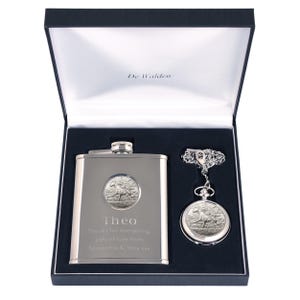 May include: A silver hip flask and pocket watch set in a black gift box. The flask and watch feature a silver horse design and are engraved with the name "Theo" and the message "Thanks for everything. Lots of love from Samantha & Terry xxx".