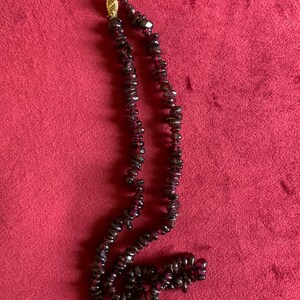 Pretty natural garnet beads hand strung with 14k gold clasp