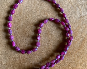 Dainty hand strung choker featuring faceted raw ruby and sterling silver beads