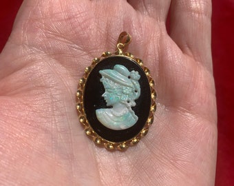 Very unique vintage cameo featuring a carved opal inlay with black onyx in 14 karat gold