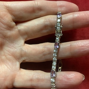 Classic tennis bracelet style sterling silver cubic zirconia and amethyst bracelet