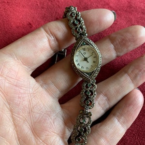 Estate sterling silver link marcasite and emerald watch