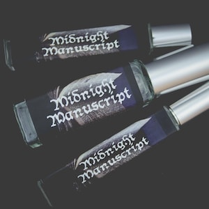 Midnight Manuscript Perfume | Fragrance | World of Noctyrrh | Lizabé & Co | Plum Violet Smoke Aged Books Ink Teakwood Patchouli Cedar