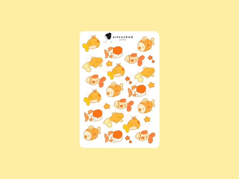 May include: A sticker sheet featuring a pattern of cartoon goldfish in shades of orange and yellow, with white accents and small star shapes. The text "artsocked goldfish" is in the top corner.
