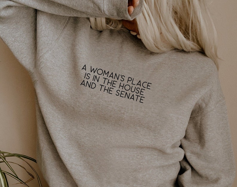 A woman's place is in the house and the senate sweatshirt Clearance
