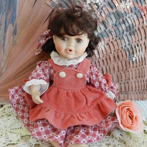 Pretty Little Miss/VINTAGE PORCELAIN DOLL/ Sitting/Clothed