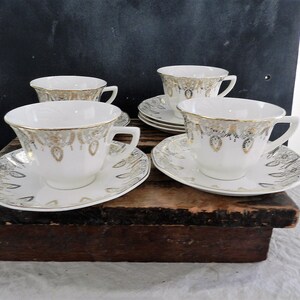 MANHATTAN 22-K GOLD/ National Brotherhood Operative Potters/ 4 Cups and 6 Saucers