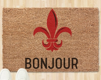 May include: A brown coir doormat with a red fleur-de-lis design and the word "BONJOUR" in black lettering.