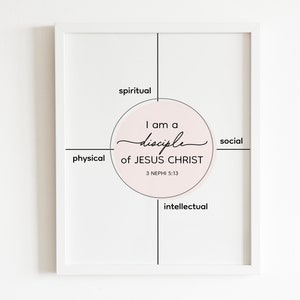 May include: A white framed print with a pink circle in the center. The circle has the text "I am a disciple of JESUS CHRIST 3 NEPHI 5:13" and is surrounded by four arrows pointing to the words "spiritual", "social", "physical", and "intellectual".