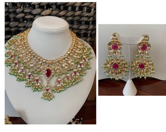 Statement kundan and ruby ring in premium gold plating