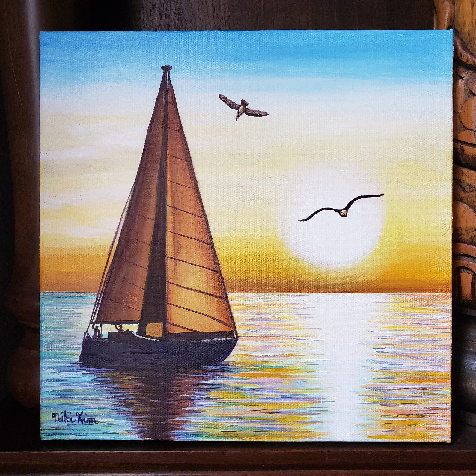 sunset sailboat framed art