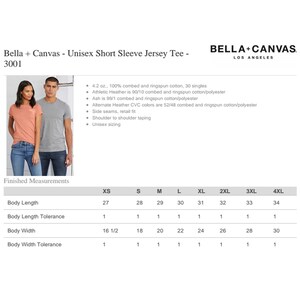 May include: A size chart for a unisex short sleeve jersey tee. The chart shows the measurements in inches for the body length, body length tolerance, body width, and body width tolerance. The sizes listed are XS, S, M, L, XL, 2XL, 3XL, and 4XL.