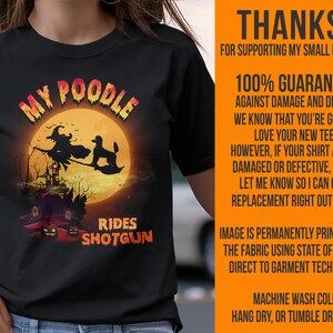 May include: Black t-shirt with a graphic of a poodle dressed as a witch riding a broomstick in front of a full moon. The text "My Poodle Rides Shotgun" is printed below the graphic.