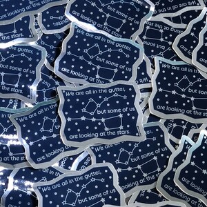 Starry Chrome Sticker (&quot;We are all in the gutter, but some of us are looking at the stars.&quot;)