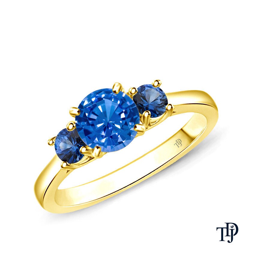 Three stone engagement ring with sapphire side stones discount