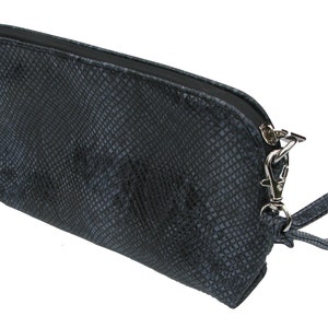May include: A black snakeskin-textured clutch bag with a zip closure and a detachable strap with a silver clasp.
