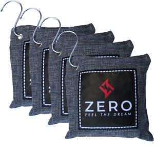 May include: Four gray charcoal odor absorbing bags with a black and red logo that says "ZERO FEEL THE DREAM". Each bag has a metal hook.