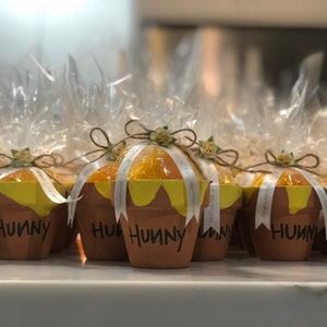 Winnie the Pooh themed Hunny Pot party favor