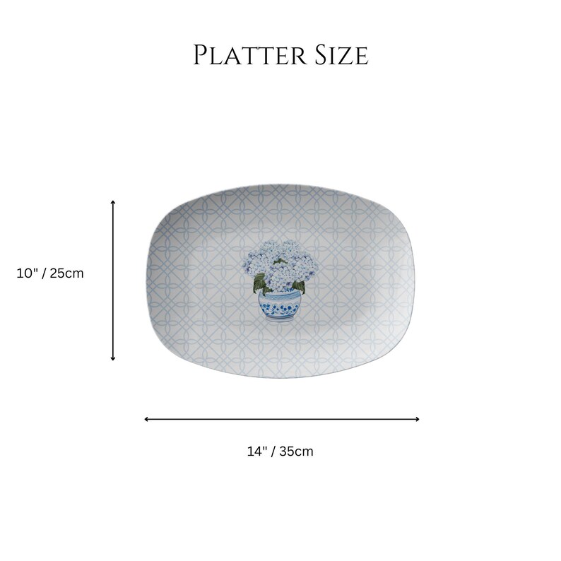 May include: A white oval platter with a blue and white floral design. The platter measures 10 inches by 14 inches.
