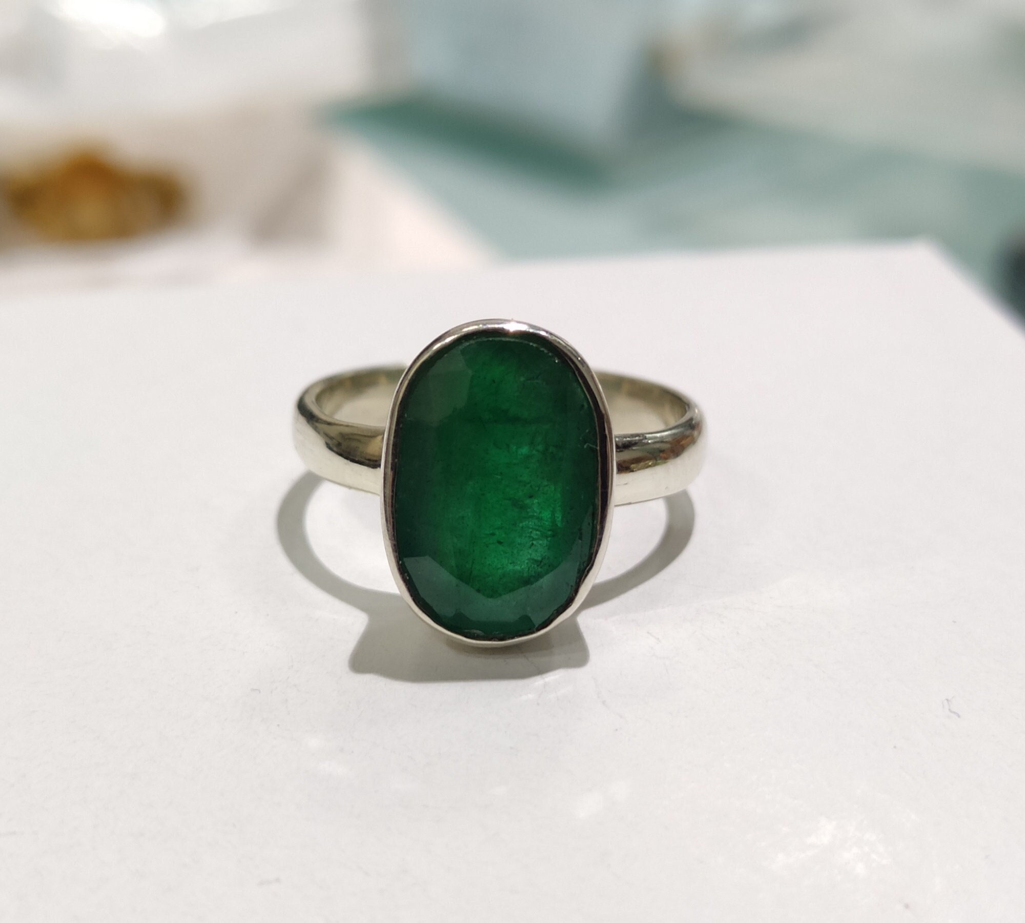 Panna stone hotsell silver ring price