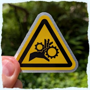 entanglement hazard brushed silver sticker